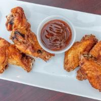 Wings · Cooked wing of a chicken coated in sauce or seasoning. served with ranch or blue cheese dres...