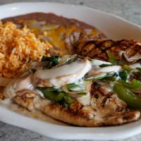 Pollo Adobe · Grilled chicken breasts covered with fresh sliced mushrooms, spinach, bell peppers, onions a...