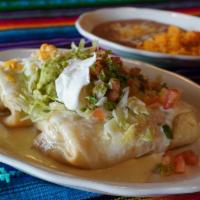 Soft Or Fried Chimichanga · Two flour tortillas deep fried, filled with grilled chicken or grilled steal and fried beans...