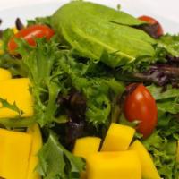 Ensalada De Aguacate Y Mango · Slices of avocado and fresh mango served with spring mix and tossed with honey ginger lime d...