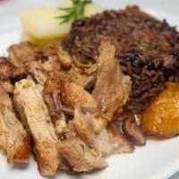 Montuno: Lechón, Moro, Yuca, Tamal Cubano Y Maduros · Sliced roasted pork served with black rice, steamed cassava, Cuban tamale and sweet plantains.