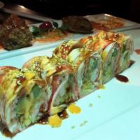 Hawaii Roll · Spicy shrimp, crunch, cucumber, avocado, asparagus inside crabmeat on top with eel sauce and...
