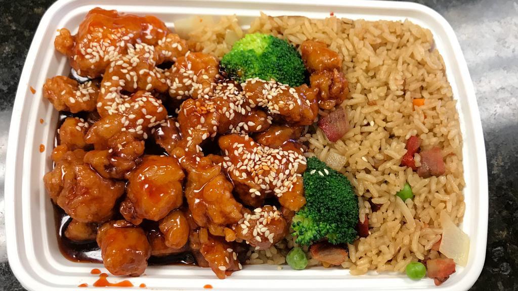 Sesame Chicken · Sliced chicken deep fried and seasoned with a mixture of sesame seeds and black pepper in our special brown sauce.