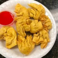 Crab Rangoon (8)蟹角 · Popular appetizer: Served with sweet and sour sauce on the side.