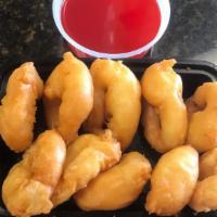 Qt Sweet & Sour Shrimp甜酸虾 · 10 of batter jumbo shrimps, Served with sweet and sour sauce on the side to be served.