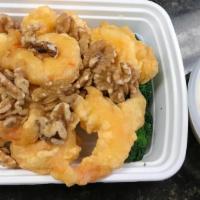 Qt Crispy Shrimp With Walnut · Popular jumbo shrimp fried to crispy with honey walnut with coconut sauce on the side.