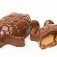 Brown Turtle · Milk chocolate with signature butter caramel and toasted almond.