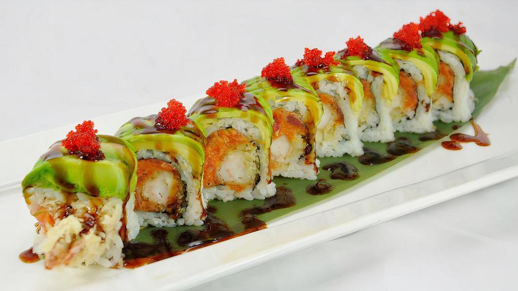Fancy Roll (8) · Shrimp tempura and cucumber inside topped with spicy tuna, avocado, and tobiko, and with eel sauce, honey sauce.