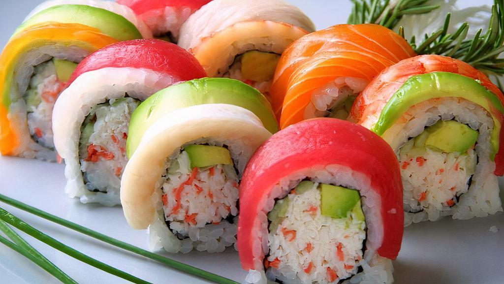 Rainbow Roll (8) · California topped with tuna salmon with white fish.