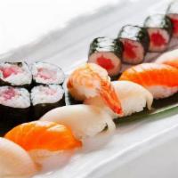 Sushi Deluxe · Ten nigiri sushi and eight tuna rolls.