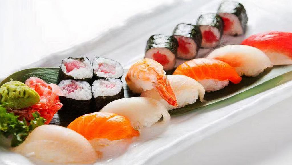 Sushi Deluxe · Ten nigiri sushi and eight tuna rolls.