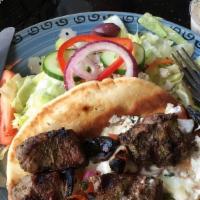 Lamb Kabob Dinner · Two skewers. Served with two hot sides and a small Greek salad.