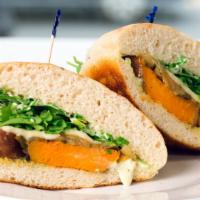 Roasted Sweet Potato Melt · Roasted sweet potato, marinated poblano peppers & onions, melted mozzarella, arugula and Jal...