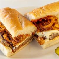 Meatloaf Sandwich · Meatloaf, American cheese, onion strings and roasted tomato ketchup on your choice of bread.
