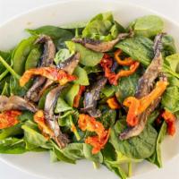 Baby Spinach Salad · Baby spinach, portabella mushrooms and sun-dried tomatoes.