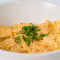 Baked Bow Ties · Bowtie pasta, tossed in our smoky cheese sauce, topped with seasoned breadcrumbs. get creati...