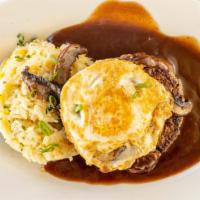 Moco Loco Entree · Seared Angus burger served over creamy corn and poblano rice, topped with roasted portabella...