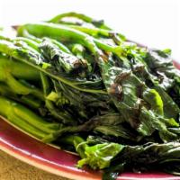 Chinese Broccoli With Oyster Sauce · Seasonal fresh chinese broccoli blanched, served with oyster sauce. Gluten free.