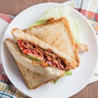 Blt Sandwich · Bacon, lettuce and tomato with mayo on toast.