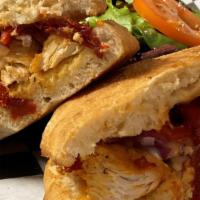 Buffalo Chicken Sandwich · Grilled chicken breast, gorgonzola cheese, roasted pepper, red onions and sun-dried tomatoes...