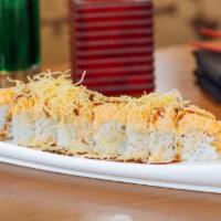 Crunchy Dynamite · Tempura Shrimp, Spicy White Fish and Crispy Potato topped with Eel Sauce