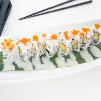 Crab Cake Roll · Kani kama and Mango, topped with Lump Crab Meat, Masago, Bell Pepper Sauce and Wasabi Aioli