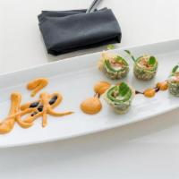 N.T · Spicy Tuna and Cream Cheese stuffed in a Jalapeño Pepper, Tempura Fried and topped with Spic...