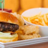 Kobe Beef Burger · Topped with tempura onion rings, Blue Cheese, Lettuce and Tomato.  Served on a Grilled Brioc...