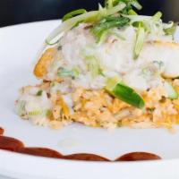 Seared Halibut · 5oz halibut, enoki, royal trump and maitake mushrooms, kimchi risotto, crab chowder sauce