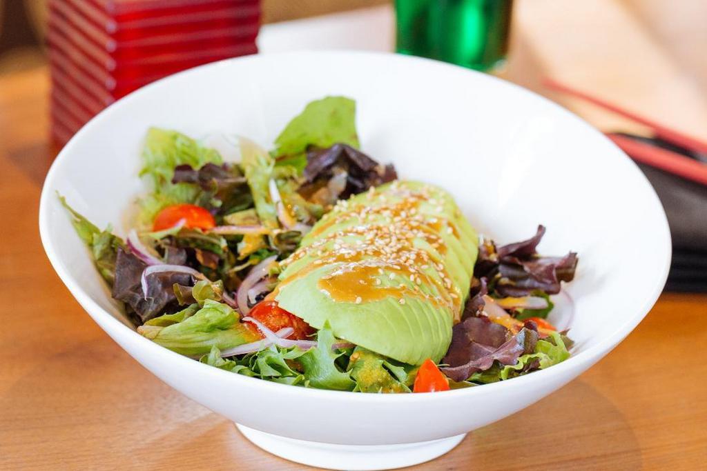 Avocado Salad · Mixed Greens, Avocado, Tomatoes, and Red Onions tossed in a Ginger Onion Dressing