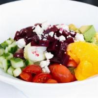 Beet Salad · Iceburg lettuce, Red Beets, Grapes, Cucumber, Avocado, Mandarin Oranges, Tomato, and Blue Ch...