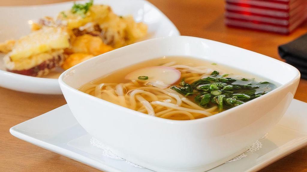 Tempura Udon · Japanese wheat Udon Noodles in a clear Dashi Broth, served with Tempura Shrimp and Vegetables