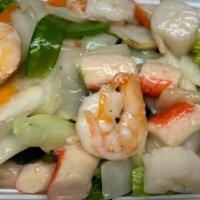 Seafood Combination · Shrimp, scallop, crab meat, cooked with mushrooms, snow pea pods, vegetables blended in a wh...