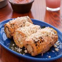 Mexican Street Corn · Grilled corn on the cob, just like from the streets of Mexico. Topped with chipotle aioli an...