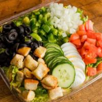 Garden Salad · Served with crisp lettuce, tomatoes, green peppers, onions, cucumbers, olives, croutons, egg...