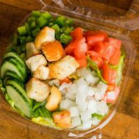 Side Salad · Crisp lettuce, tomatoes, onions, green peppers, cucumbers, and croutons served with your cho...
