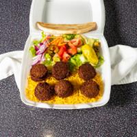 Falafel Platter · All platters comes with yellow basmati rice lettuce tomatoes onions cucumber carrots olives ...