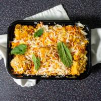 Chicken Biryani · A special dish of layered cooked rice meat with masala powder fried onions and garnished wit...