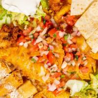 Fiesta Platter · A sampling of all-time favorite: nachos, mini-quesadillas, mini-flautas, buffalo wings, guac...