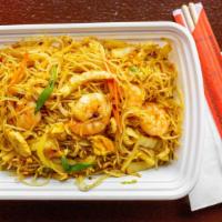 Singapore Mai Fun · Spicy. Chicken, shrimp, egg and veggies in curry flavor. Thin rice noodle.