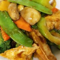 Home-Style Fried Bean Curd · Deep-fried tofu with green pepper, broccoli, carrots and water chestnuts in black bean sauce...