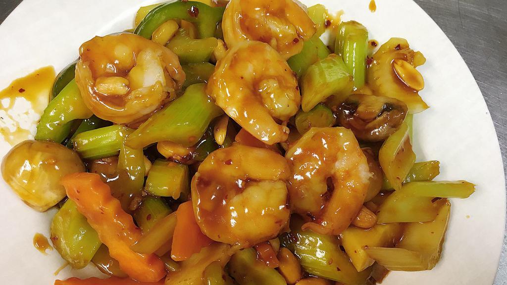 Kung Pao Shrimp · Spicy. Famous little basil house spicy sauce sauteed with green peppers, carrots, celery and topped with peas. Served with white rice. Hot and spicy.