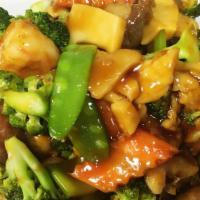 Sizzling Triple Delight · Spicy. Chicken, shrimp and beef sauteed with vegetables in a spicy garlic sauce. Hot and spi...