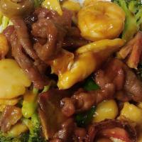 Five Treasures · Chicken, jumbo, shrimp, beef, scallop, pork sauteed with vegetables in a brown sauce.