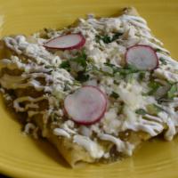 Enchiladas · Three rolled soft corn tortillas stuffed with your choice of filling and topped with green t...