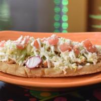 Huarache · Thick hand made soft corn tortilla with your choice of filling, topped with refried beans, l...
