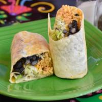 Small Burrito · Flour tortilla stuffed with rice, beans, lettuce, guacamole, drizzled sour cream, and cheese.