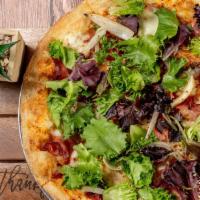 Pizza Prosciutto · Fresh Mozzarella, prosciutto and caramelized onions, topped with mixed greens, and drizzled ...