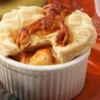 Lobster Pie (Frozen) · Fresh maine lobster meat, our rockport lobster bisque, topped with our seasoned ritz cracker...