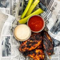 Smoked Wings · 10 of our smoked wings that are slow cooked for two hours with our house rub. They can be dr...